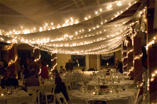 Christmas lights were strung throughout the reception hall for a warm 
