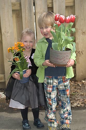 Ben and Lucy Holding Flowers