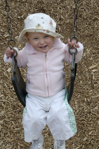 Lucy Rides on the Swing